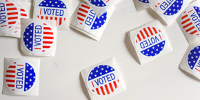 raised hands with text BE A VOTER a non-partisan guide
