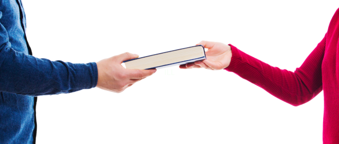 Two people exchanging two books.